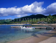 ANTIGUA, Morris Bay, tourists in boat, at pier, view from Curtain Bluff, ANT686JPL