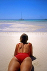 AUSTRALIA, Queensland, Great Barrier Reef, Upola Cay, sunbather on beach, AUS731JPL