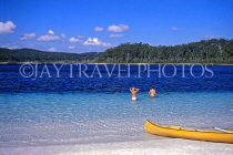 AUSTRALIA, Queensland, Lake Mackenzie, FRASER ISLAND, canoe on beach, AUS731JPL
