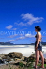 AUSTRALIA, Queensland, WHITSUNDAY ISLANDS, woman on beach, AUS749JPL