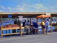 BAHAMAS, New Providence Island, Nassau, Potters Cay, fish market stalls, BAH339JPL