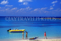 BAHAMAS, Paradise Island, beach, boat and holidaymakers, BAH219JPL