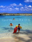BAHAMAS, Paradise Island, beach, seascape, child with floats, BAH496JPL