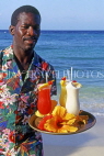BAHAMAS, Paradise Island, waiter on beach with cocktails on tray, BAH297JPL