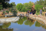 BAHRAIN, Al Areen Wildlife Park, and visitors by pond and waterbirds, BHR1584JPL