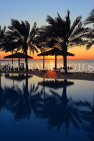 BAHRAIN, Al Jasra, house outdoor pool, palm trees and sunset, BHR1752JPL