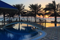 BAHRAIN, Al Jasra, house pool and terrace by the sea, sunset view, BHR1551JPL