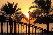 BAHRAIN, Al Jasra, house poolside bridge and sunset, BHR604JPL
