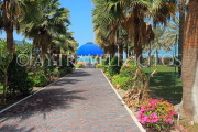 BAHRAIN, Al Jasra, seafront house gardens with date palm trees, BHR1823JPL