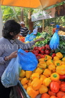 BAHRAIN, Budaiya, Farmers' Market, shopper at vegetable stall, BHR1159JPL