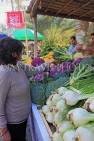 BAHRAIN, Budaiya, Farmers' Market, shopper at vegetable stall, BHR1161JPL