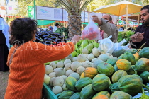 BAHRAIN, Budaiya, Farmers' Market, shopper at vegetable stall, BHR1796JPL