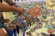 BAHRAIN, Manama, Bahrain Exhibition Centre, Autumn Fair, choosing bracelets, BHR1128JPL