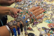 BAHRAIN, Manama, Bahrain Exhibition Centre, Autumn Fair, choosing bracelets, BHR1129JPL