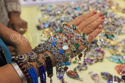 BAHRAIN, Manama, Bahrain Exhibition Centre, Autumn Fair, choosing bracelets, BHR1131JPL