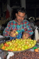 BAHRAIN, Manama, Central Market, vendor with Jujube fruit, BHR1294JPL