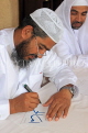 BAHRAIN, Manama, Grand Mosque (Al-Fateh), caligraphy artist on mosque open day, BHR925JPL