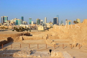 BAHRAIN, Manama, Karababad, Bahrain Fort (Qal'at al Bahrain), Manama skyline, BHR652JPL