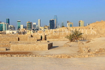 BAHRAIN, Manama, Karababad, Bahrain Fort (Qal'at al Bahrain), Manama skyline, BHR653JPL