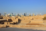 BAHRAIN, Manama, Karababad, Bahrain Fort (Qal'at al Bahrain), Manama skyline, BHR657JPL