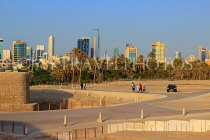 BAHRAIN, Manama, Karababad, Bahrain Fort (Qal'at al Bahrain), Manama skyline, BHR660JPL