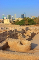 BAHRAIN, Manama, Karababad, Bahrain Fort (Qal'at al Bahrain), excavations, Manama skyline, BHR650JPL