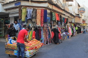 BAHRAIN, Manama Souk (Souq), clothes shops and fruit seller, BHR705JPL