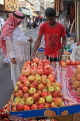BAHRAIN, Manama Souk (Souq), fruit seller, apples and pomegranates, BHR707JPL