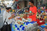 BAHRAIN, Manama Souk (Souq), perfume stall, customer and vendor, BHR992JPL