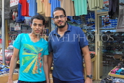 BAHRAIN, Manama Souk (Souq), two Bahraini men posing for photo, BHR691JPL