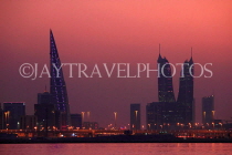 BAHRAIN, Manama night skyline, view from Muharraq coastal fishing village area, BHR2533JPL