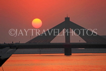 BAHRAIN, Muharraq, Shaikh Isa Causeway Bridge, view from fishing village area, sunset, BHR2504JPL