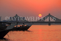 BAHRAIN, Muharraq, Shaikh Isa Causeway Bridge, view from fishing village area, sunset, BHR2507JPL