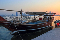 BAHRAIN, Muharraq, coastal fishing village area, Dhow moored by a pier, dusk, BHR2484JPL