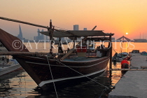 BAHRAIN, Muharraq, coastal fishing village area, Dhow moored by a pier, sunset, BHR2491JPL