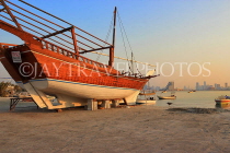 BAHRAIN, Muharraq, coastal fishing village area, Dhow on beach, BHR2465JPL