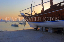 BAHRAIN, Muharraq, coastal fishing village area, Dhow on beach, dusk, BHR2471JPL