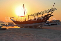 BAHRAIN, Muharraq, coastal fishing village area, Dhow on beach, sunset, BHR2469JPL