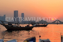 BAHRAIN, Muharraq, coastal fishing village area, fishing boats, and sunset, BHR2495JPL