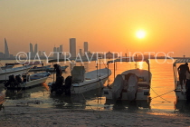 BAHRAIN, Muharraq, coastal fishing village area, fishing boats, and sunset, BHR2500JPL