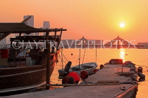 BAHRAIN, Muharraq, coastal fishing village area, view towards Shaikh Isa Causeway Bridge, sunset, BHR2515JPL