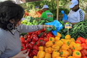 BAHRAIN, Noor El Ain, Garden Bazaar, Farmers Market, shopper at vegetable stall, BHR1160J
