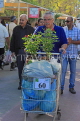 BAHRAIN, Noor El Ain, Garden Bazaar, Farmers Market, shopper with trolly, BHR1156JPL