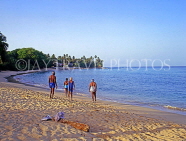 BARBADOS, West Coast, Barbadians walking along beach, BAR467JPL