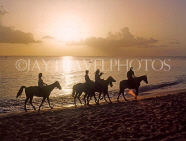 BARBADOS, West Coast, horse riding along the beach, at dusk, BAR540JPL
