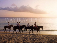 BARBADOS, West Coast, horse riding along the beach, at dusk, BAR543JPL