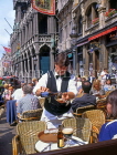 Belgium, BRUSSELS, Grand Place, outdoor cafe, and waiter serving drinks, BRS56JPL