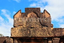 CAMBODIA, Angkor, Banteay Srei Temple, red sandstone carvings on gateways, CAM1088JPL