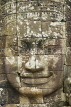 CAMBODIA, Angkor Wat, stone carved face at Bayon temple, CAM57JPL
