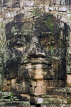 CAMBODIA, Angkor Wat, stone carved face at Bayon temple, CAM58JPL